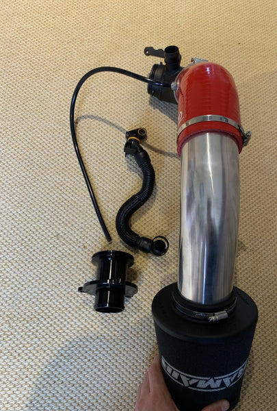 Another awesome setup with a larger turbo elbow and required golf r breather hose along with a ramair filter and a turbo muffler delete shown in the picture. This is with the red silicone hose 